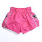 MTM Essentials Muay Thai Shorts Pink on model in fighting stance