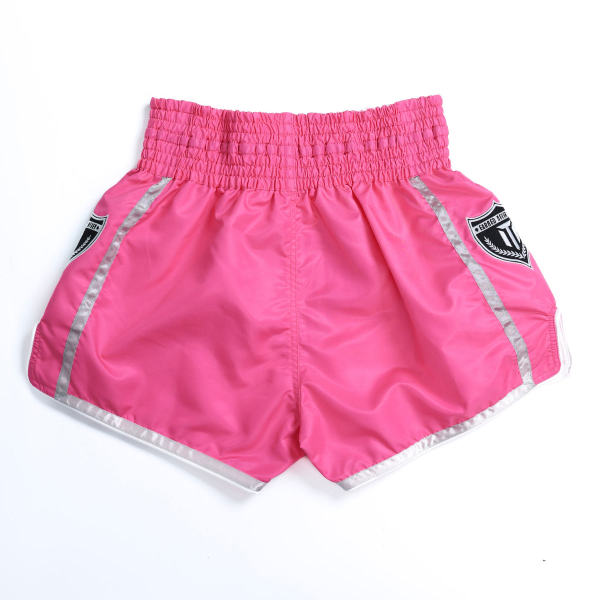 MTM Essentials Muay Thai Shorts Pink on model in fighting stance