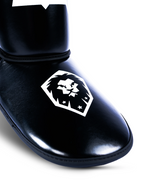 Mavinn Original Tribute Shin Guards in Black, back view with strap detail