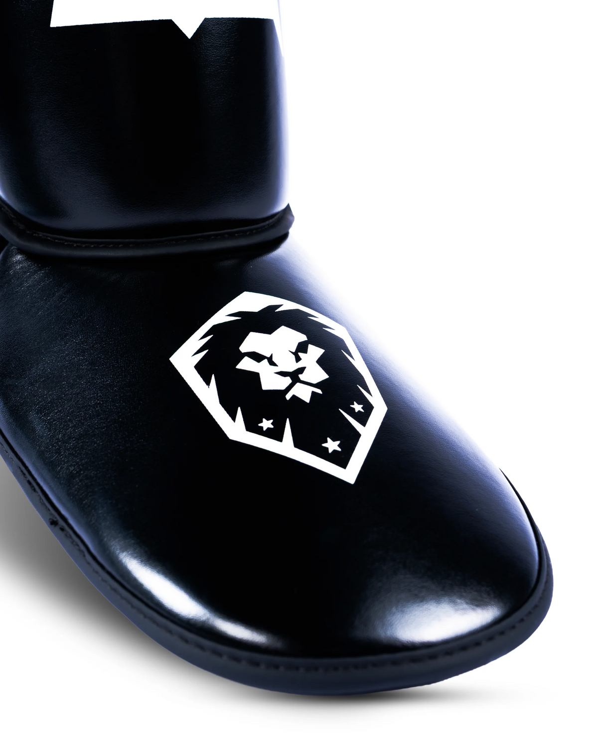 Mavinn Original Tribute Shin Guards in Black, back view with strap detail