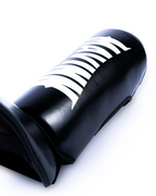 Mavinn Original Tribute Shin Guards in Black, close-up of padding and material texture