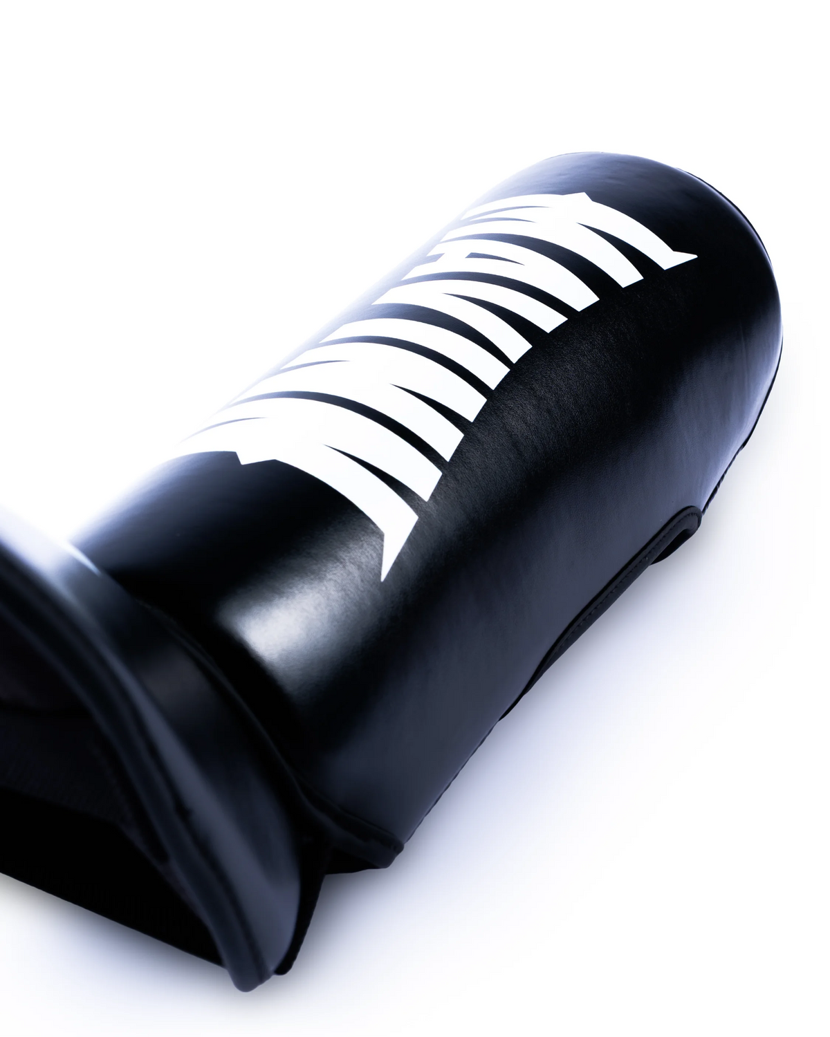 Mavinn Original Tribute Shin Guards in Black, close-up of padding and material texture