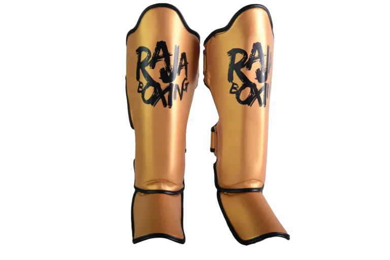 Raja Boxing Lightweight Shin Guards V4 in gold, side view