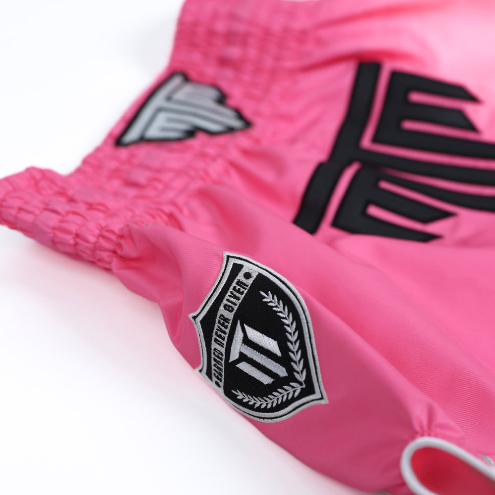 MTM Essentials Muay Thai Shorts Pink on model kicking