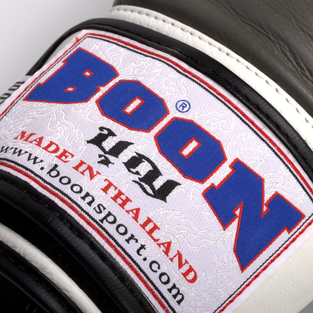 Close-up of BOON Sport Compact Velcro Glove in black and white, showing BOON logo
