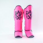 Raja Boxing shin guards in action during a kick