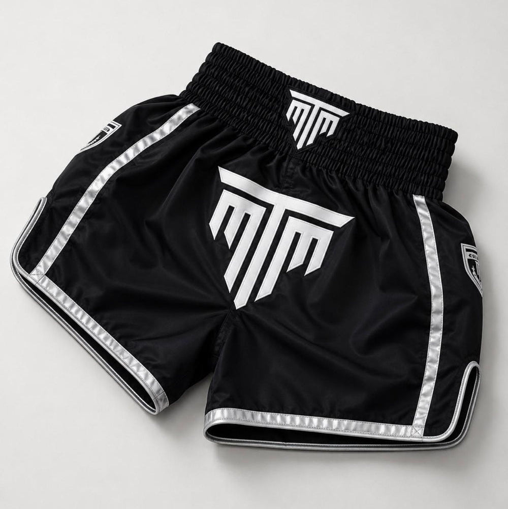 MTM Essentials Muay Thai Shorts in black, detailed view