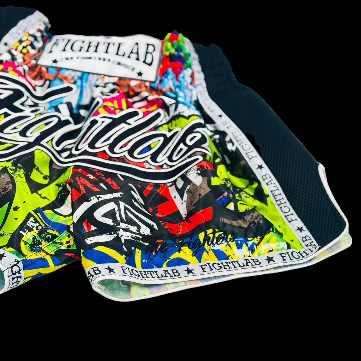Fightlab Kowabunga Thai Boxing Shorts on model, front kick