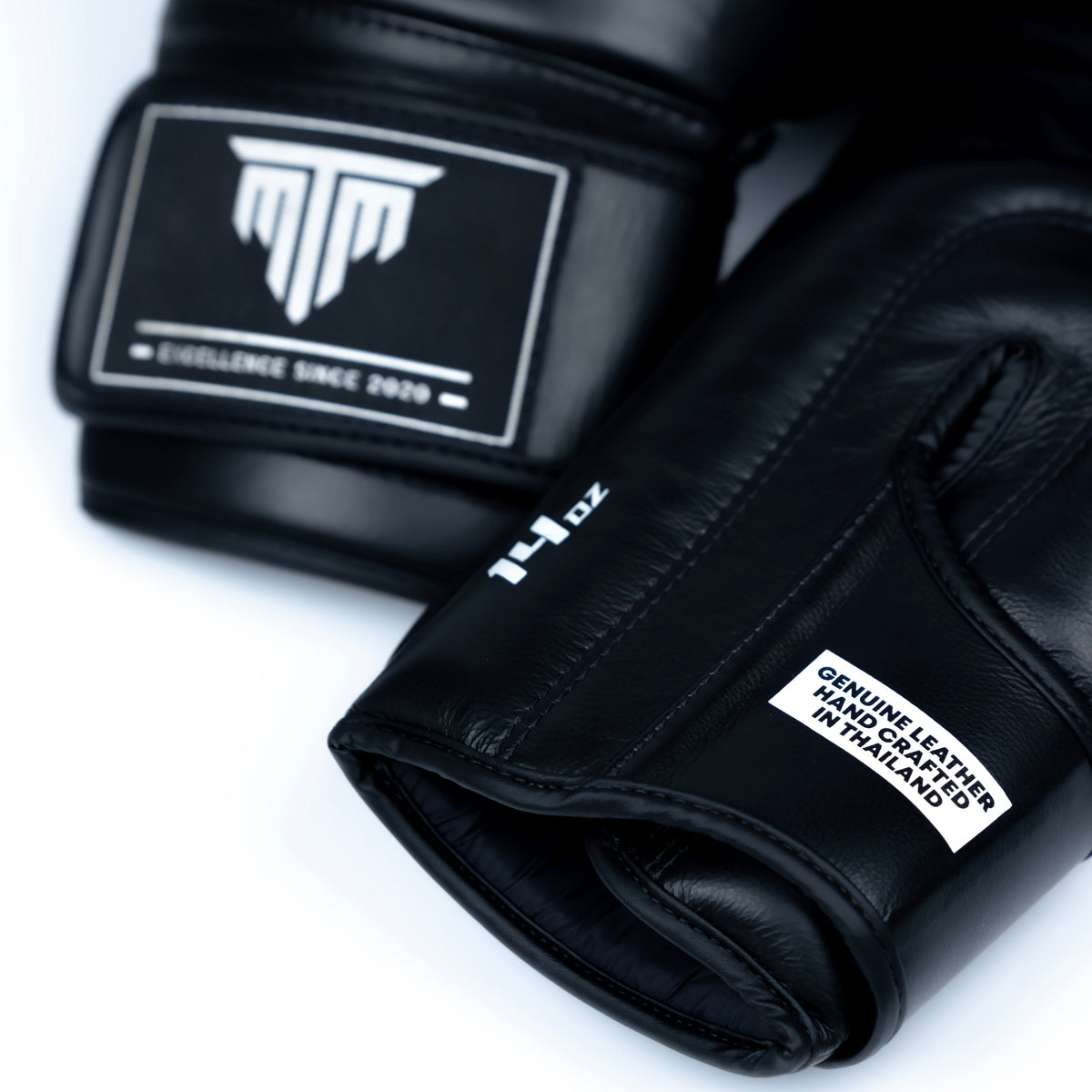 MTM Sport Pro X1 Velcro Boxing Gloves in black, pair on a clean background