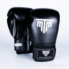 Detail of the MTM Sport logo on the wrist of the Pro X1 Velcro Boxing Gloves