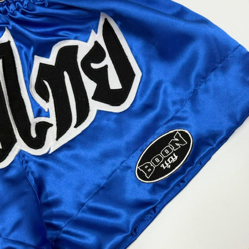 BOON Sport Classic Muay Thai Shorts in blue, side view with leg slit