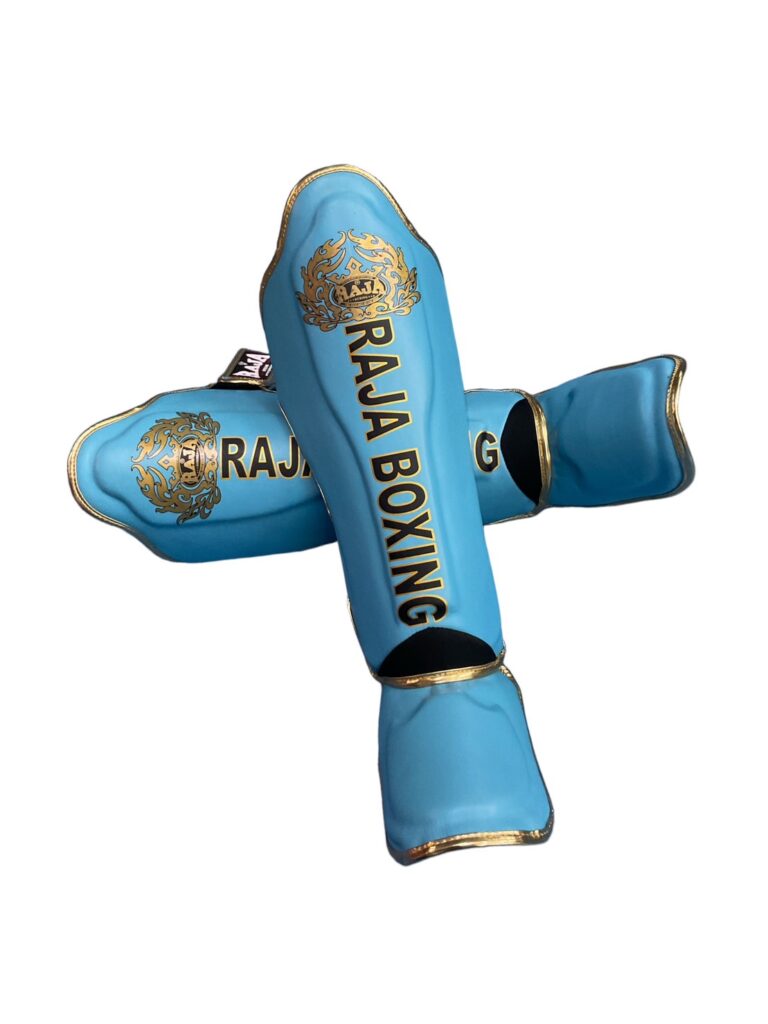 Raja Boxing LS-2 Slim Shin Guards in Sky Blue, angled view