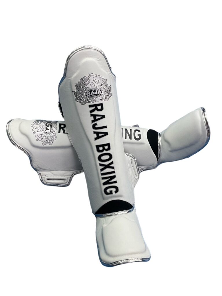 Raja Boxing LS-2 Slim Shin Guards in white, angled view