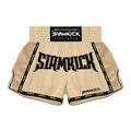 Siamkick Fightwear Muay Thai shorts in beige with black trim, featuring a large black 'SIAMKICK' logo on the front and a black waistband label.