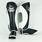 Raja Boxing Muay Thai Style Shin Guards, side view showing strap closure