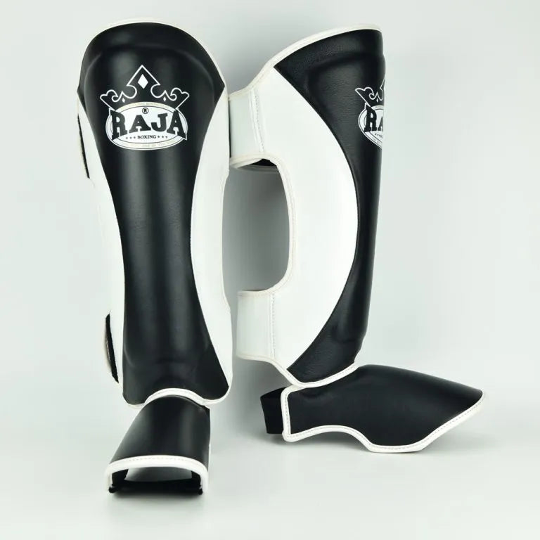Raja Boxing Muay Thai Style Shin Guards, side view showing strap closure
