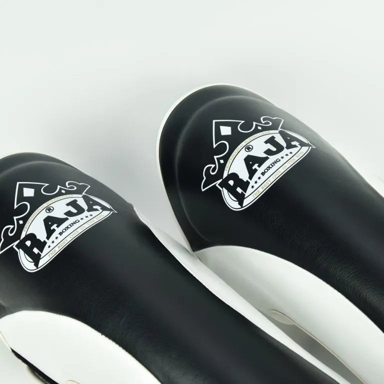 Close-up of Raja Boxing Shin Guards showing padding and stitching detail
