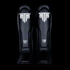 MTM Sport VX Shin Guards in black, side view on white background