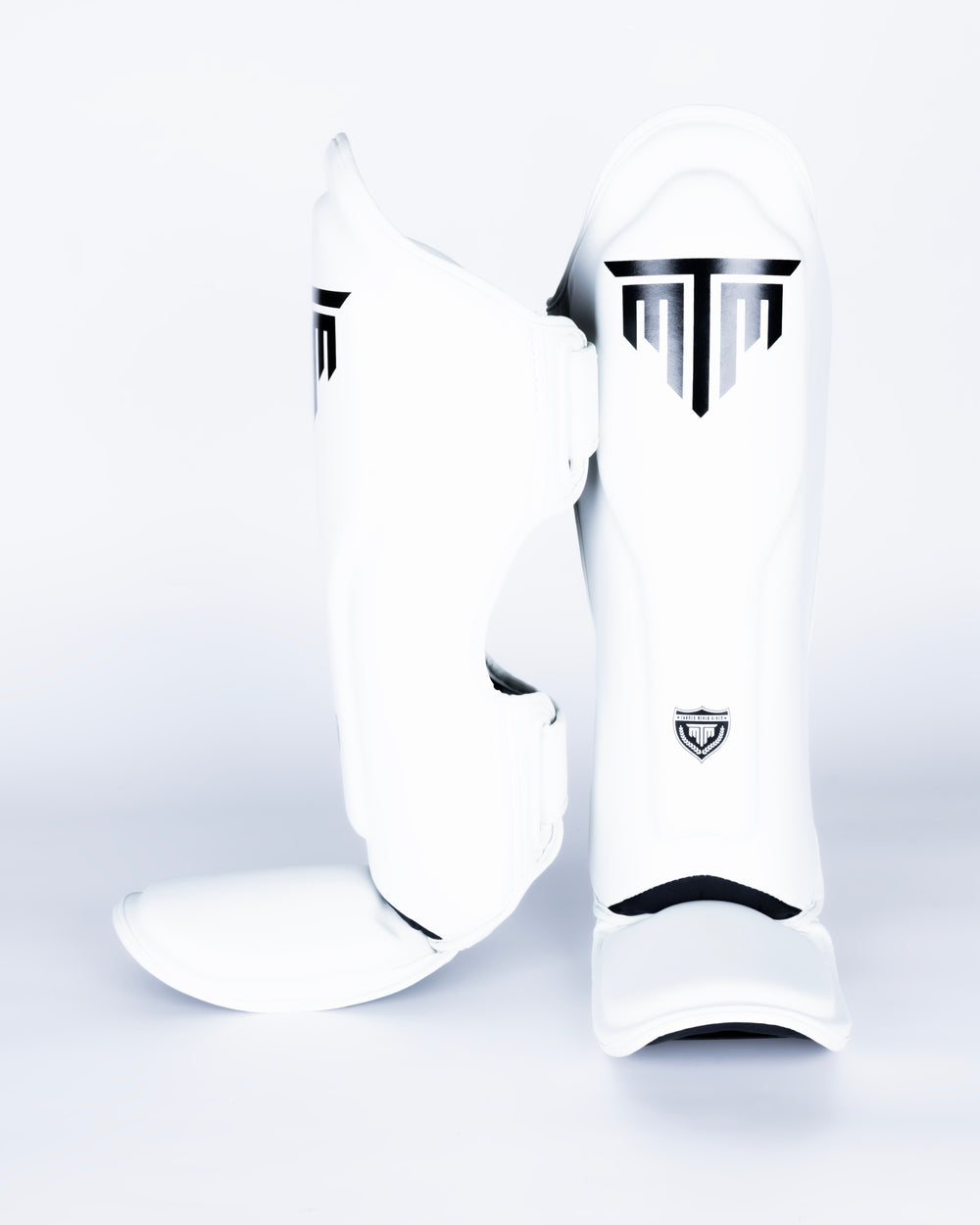 MTM Sport VX Shin Guards in white, angled view