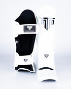 MTM Sport VX Shin Guards in white, side view showing ergonomic shape
