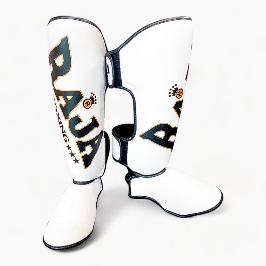 Close-up of RAJA BOXING Standard Shin Guards in White
