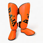 Raja Boxing Standard Shin Guards in orange, close-up